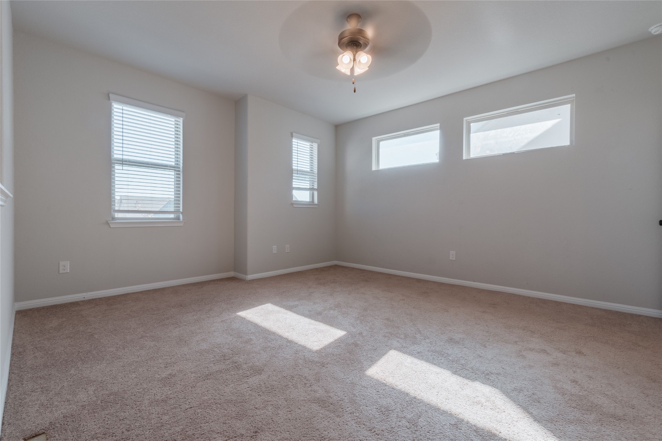 3810 Brushy Creek Road, Unit 77 Cedar Park, TX 78613 - Photo 26 of 33 an empty room with windows and fan