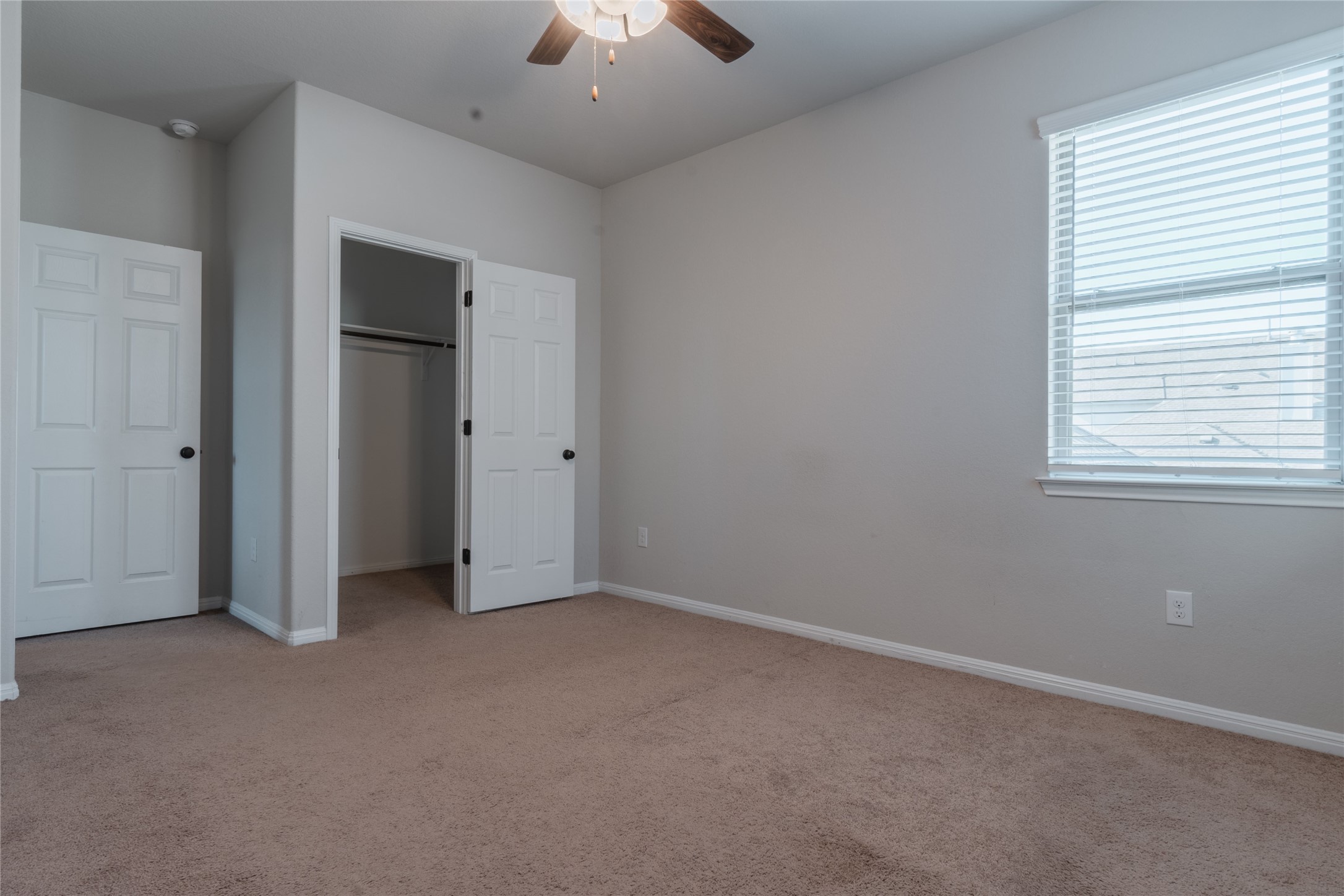 3810 Brushy Creek Road, Unit 77 Cedar Park, TX 78613 - Photo 30 of 33 an empty room with a empty space and a ceiling fan