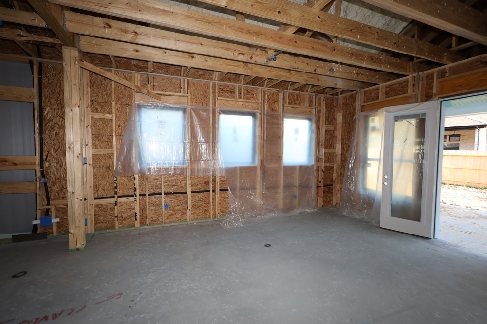 3408 Chestnut Colony Court Conroe, TX 77385 - Photo 12 of 22 a view of empty room with wooden floor and fan