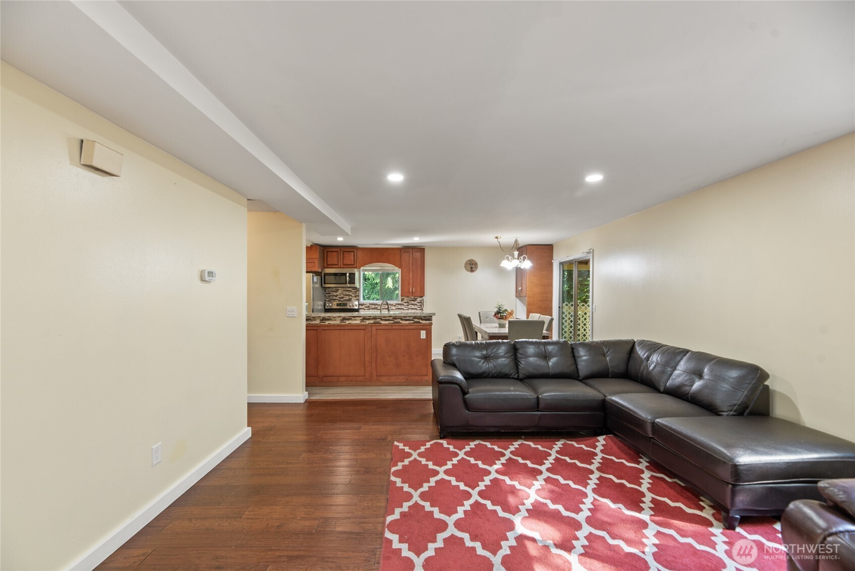 10606 68th Place South Seattle, WA 98178 - Photo 4 of 31 a living room with furniture and a rug