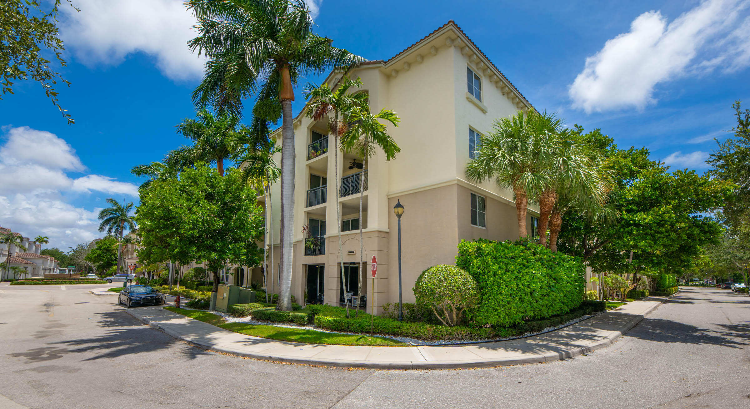 3107 Renaissance Way Boynton Beach, FL 33426 - Photo 2 of 37 a view of a street with a building in front of it