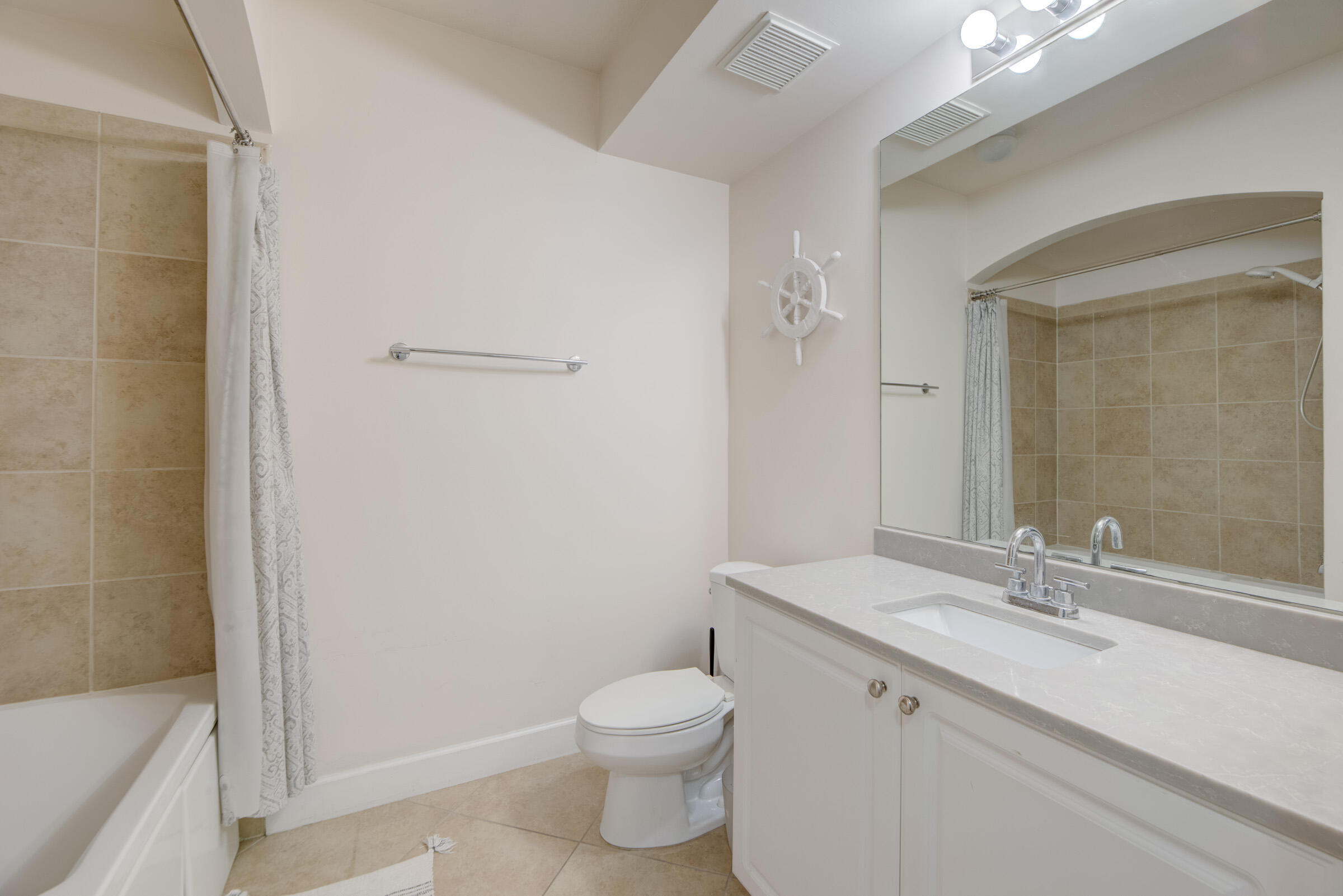 3107 Renaissance Way Boynton Beach, FL 33426 - Photo 21 of 37 a bathroom with a sink a toilet and shower