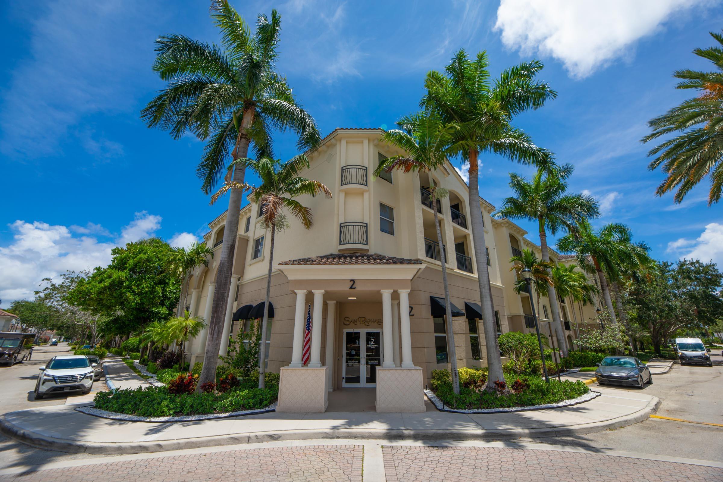 3107 Renaissance Way Boynton Beach, FL 33426 - Photo 25 of 37 a front view of a building with palm trees