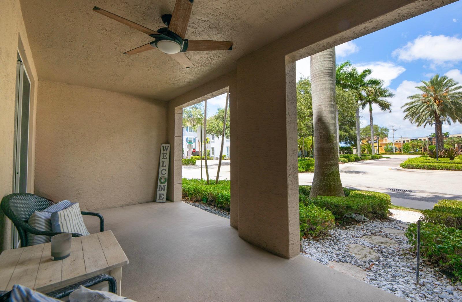 3107 Renaissance Way Boynton Beach, FL 33426 - Photo 3 of 37 a view of a patio with a table and chairs