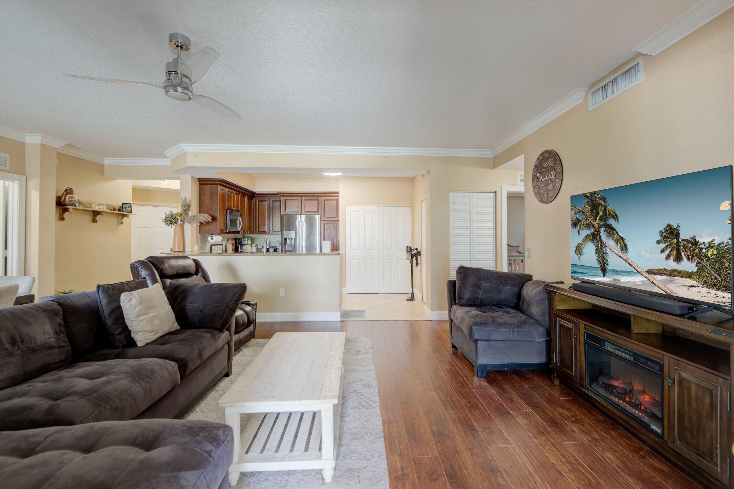 3107 Renaissance Way Boynton Beach, FL 33426 - Photo 5 of 37 a living room with furniture and a wooden floor