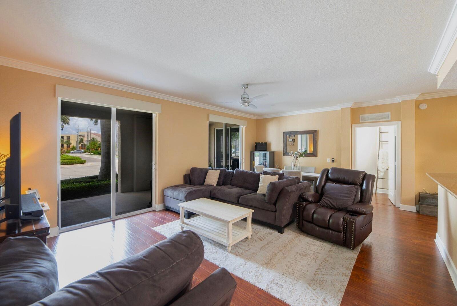 3107 Renaissance Way Boynton Beach, FL 33426 - Photo 6 of 37 a living room with furniture and a couch