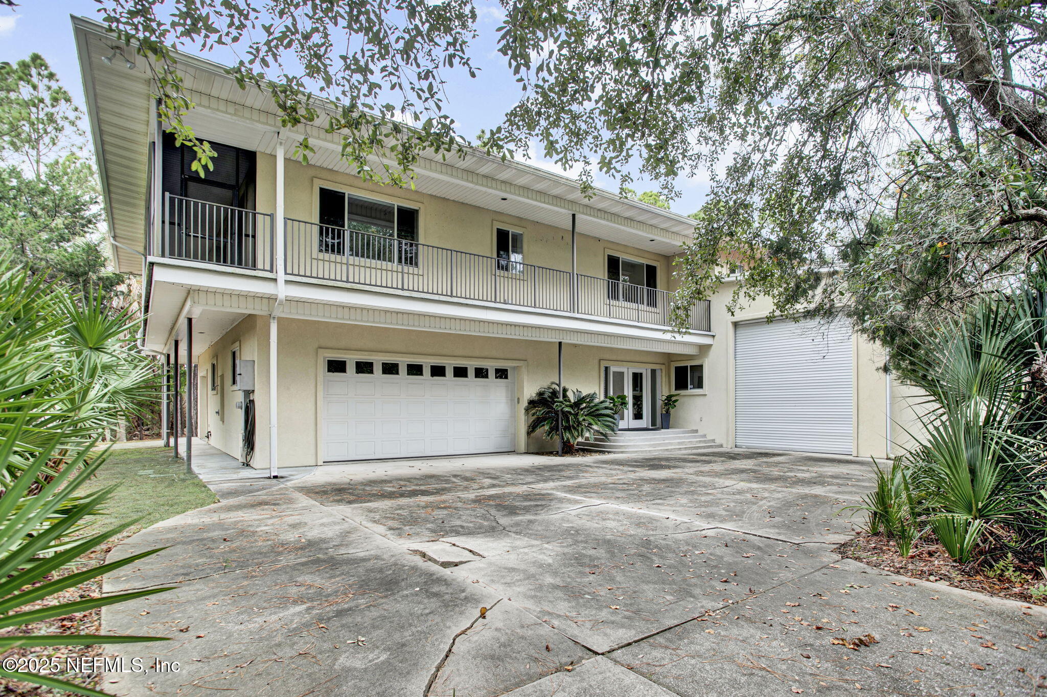 15501 Waterville Road Jacksonville, FL 32226 - Photo 17 of 24 a front view of a house with a yard and garage