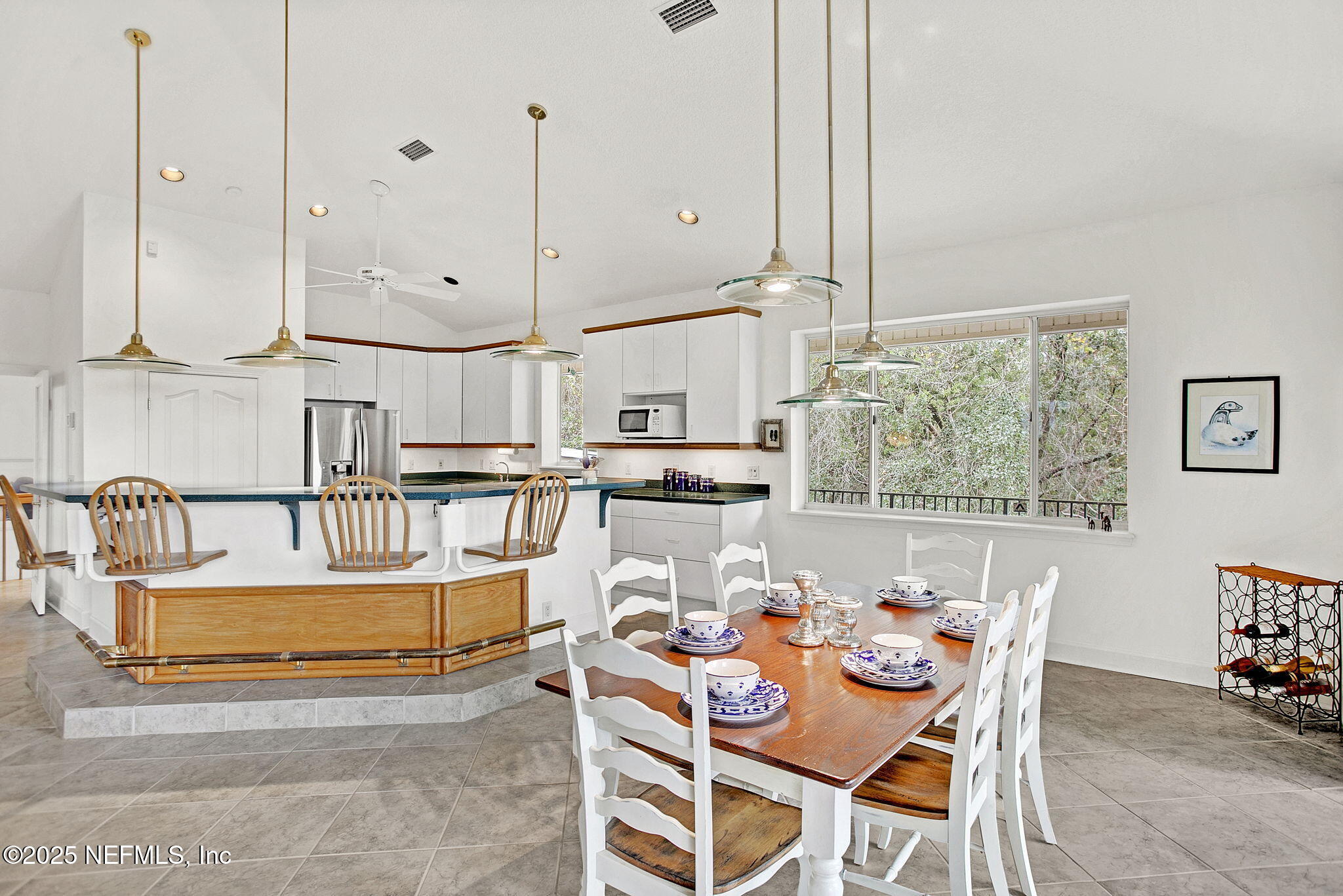 15501 Waterville Road Jacksonville, FL 32226 - Photo 7 of 24 a large kitchen with a table and chairs