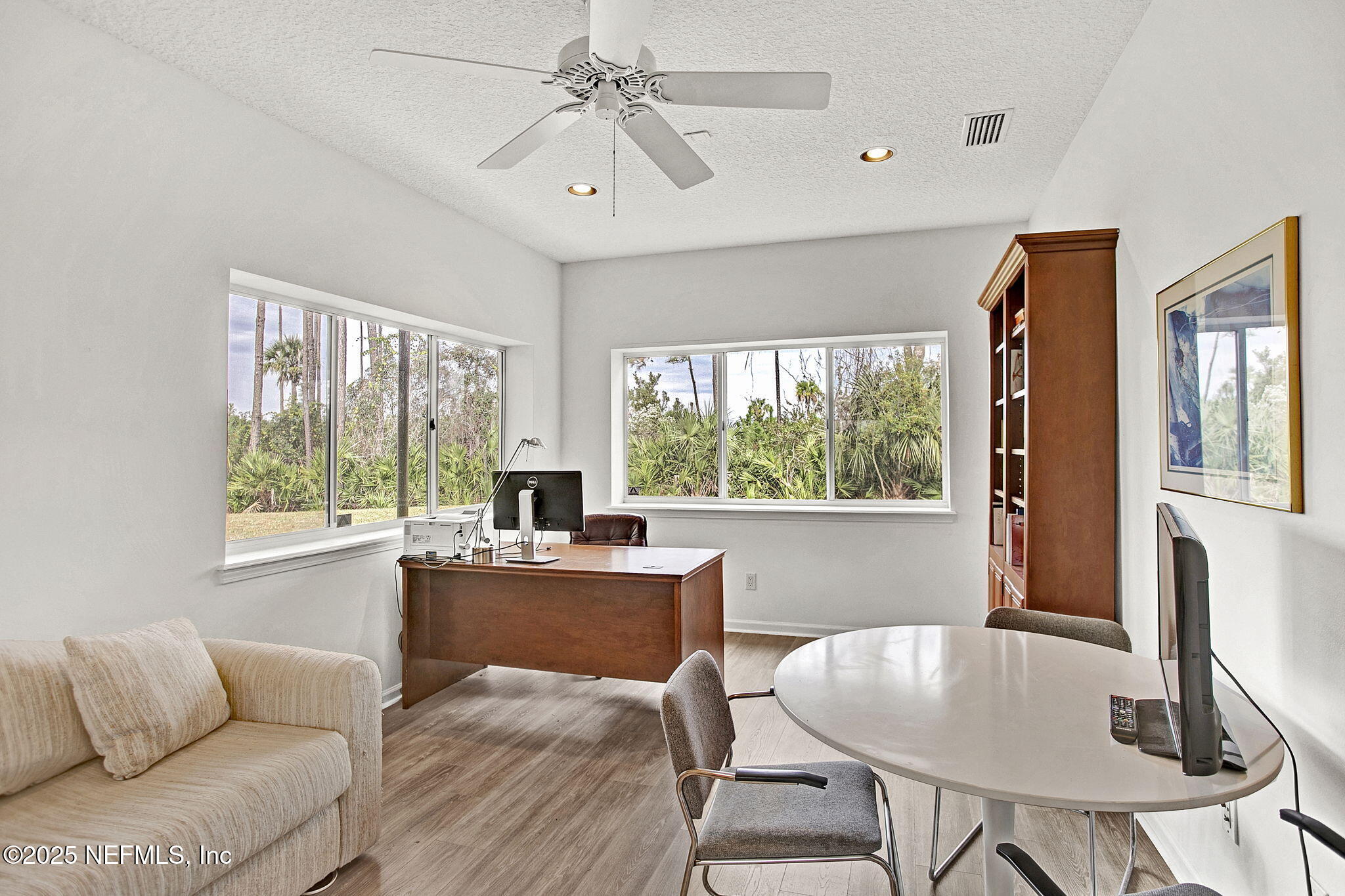 15501 Waterville Road Jacksonville, FL 32226 - Photo 10 of 24 a workspace with furniture and a window