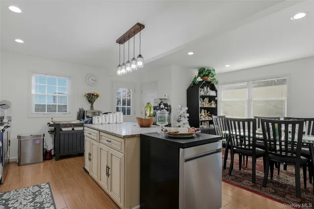 a bedroom with a bed and a television