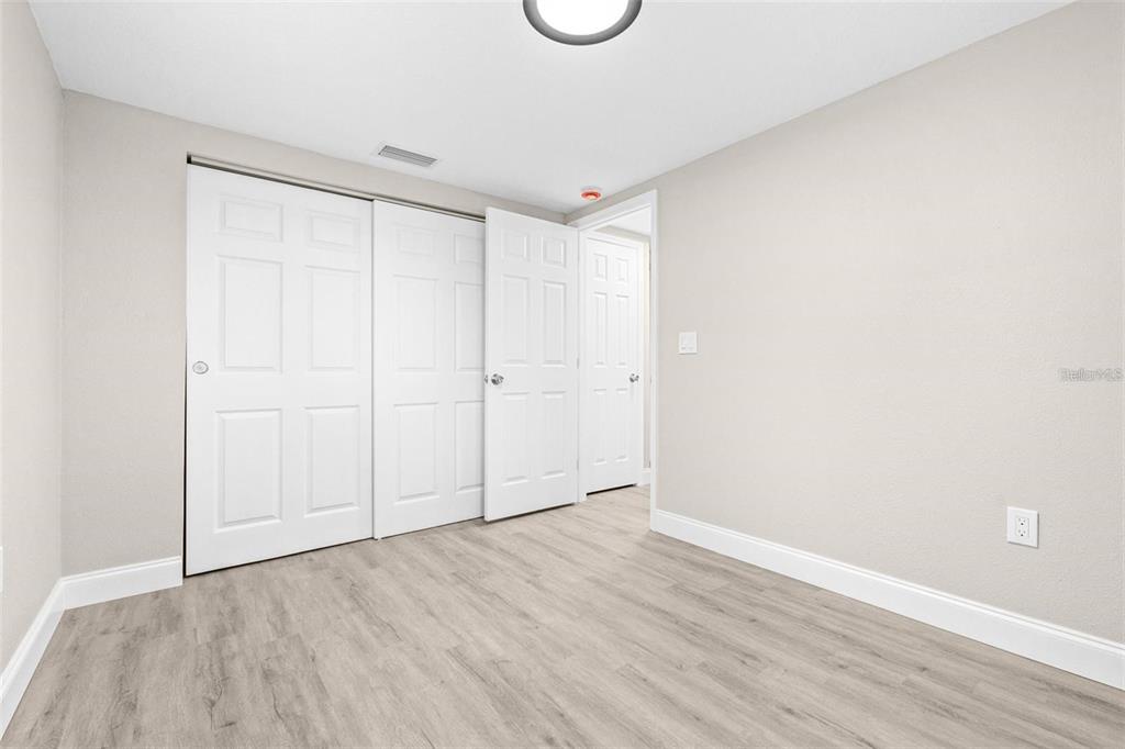 13926 Helen Avenue Hudson, FL 34667 - Photo 18 of 44 a view of an empty room