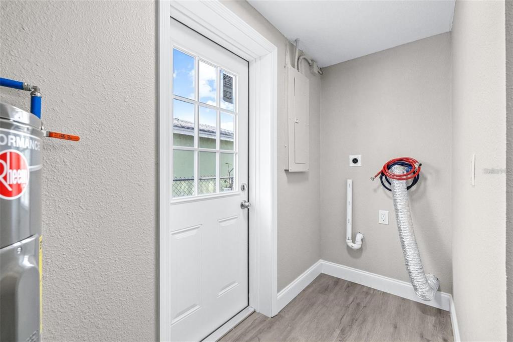 13926 Helen Avenue Hudson, FL 34667 - Photo 22 of 44 a view of an entryway with wooden floor