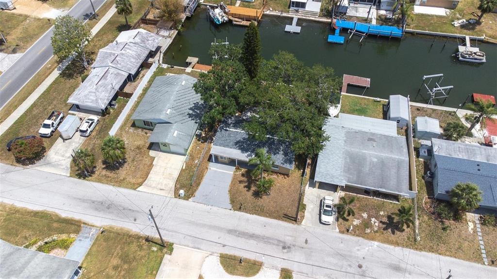 13926 Helen Avenue Hudson, FL 34667 - Photo 30 of 44 an aerial view of residential houses with outdoor space