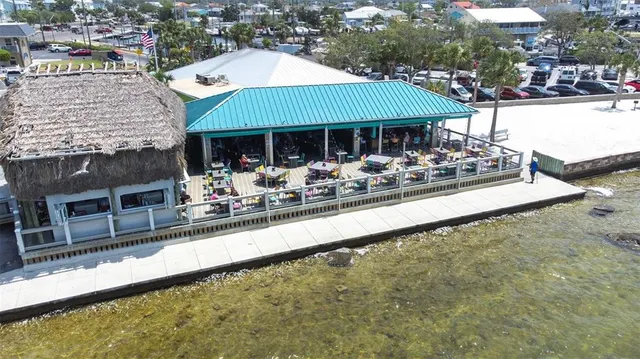 a front view of a house with swimming pool