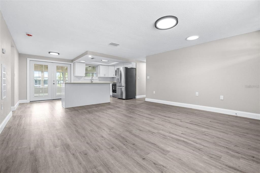 13926 Helen Avenue Hudson, FL 34667 - Photo 5 of 44 a view of kitchen and wooden floor