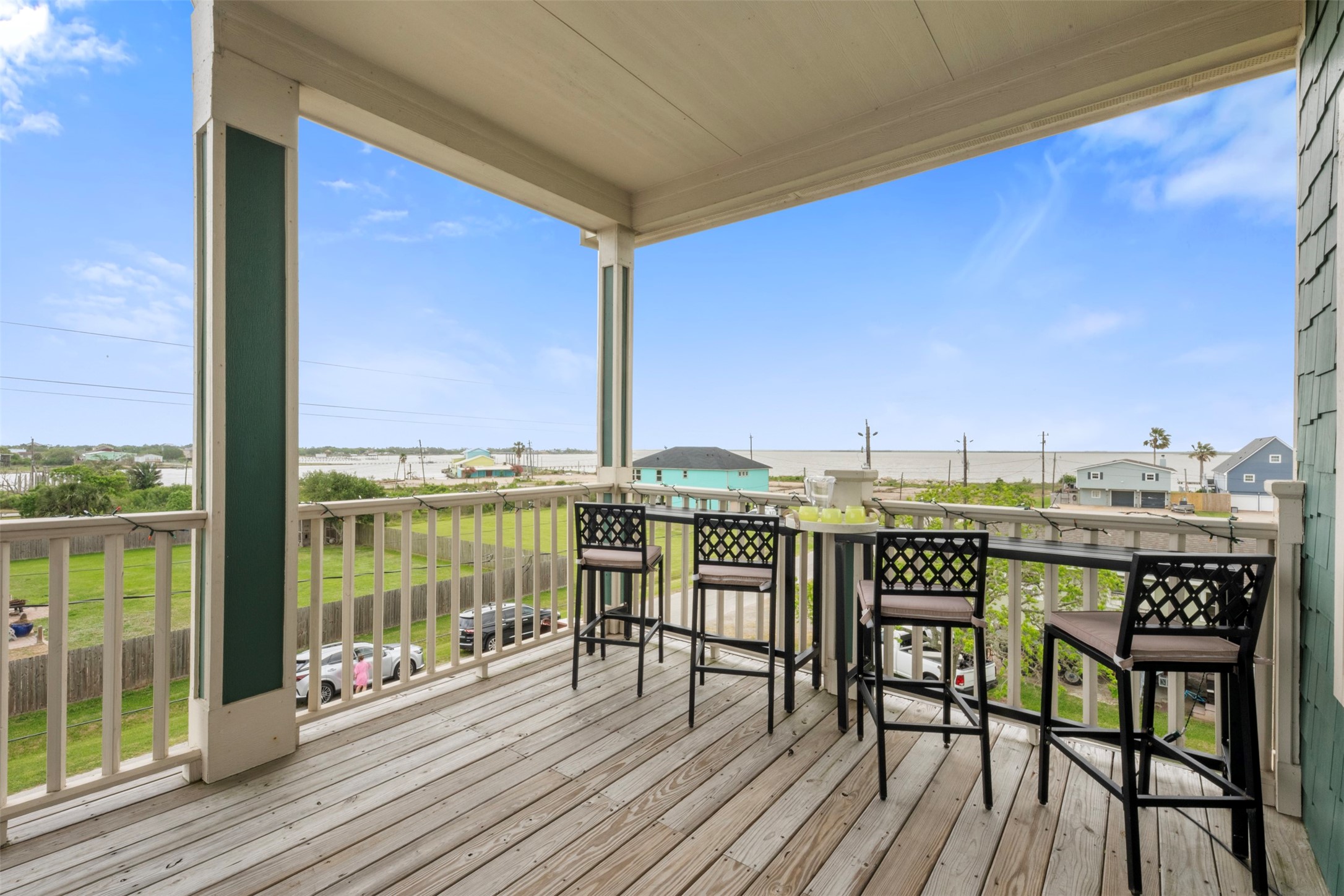 1026 20th Street Dickinson, TX 77539 - Photo 14 of 25 a view of a balcony with wooden floor and outdoor space