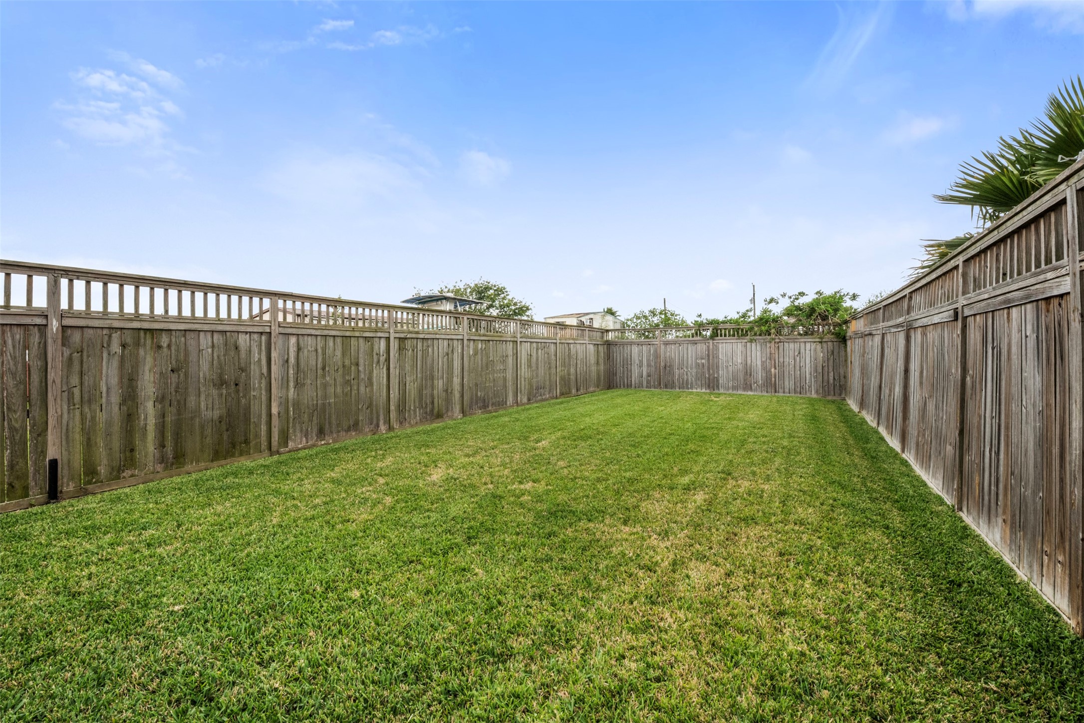 1026 20th Street Dickinson, TX 77539 - Photo 17 of 25 a view of a backyard with a garden