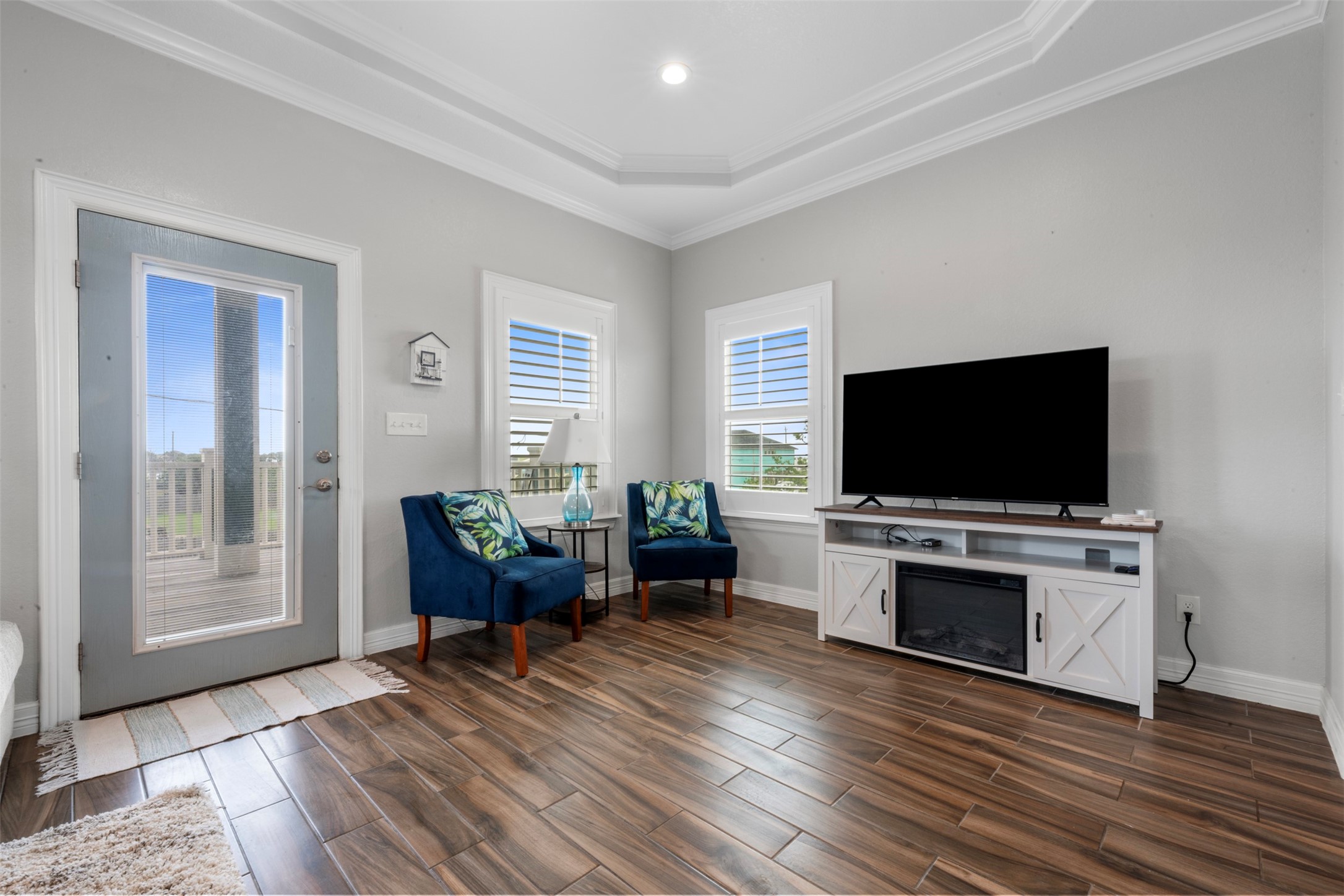 1026 20th Street Dickinson, TX 77539 - Photo 4 of 25 a living room with furniture and a flat screen tv