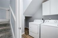 1026 20th Street Dickinson, TX 77539 - Photo 10 of 25 a utility room with dryer and washer