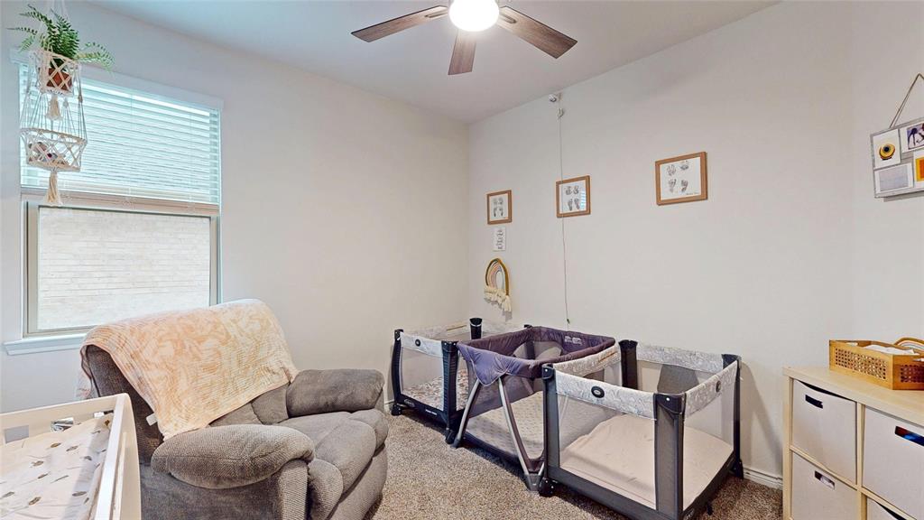4005 Glastonbury Road McKinney, TX 75071 - Photo 26 of 39 a living room with furniture and a window