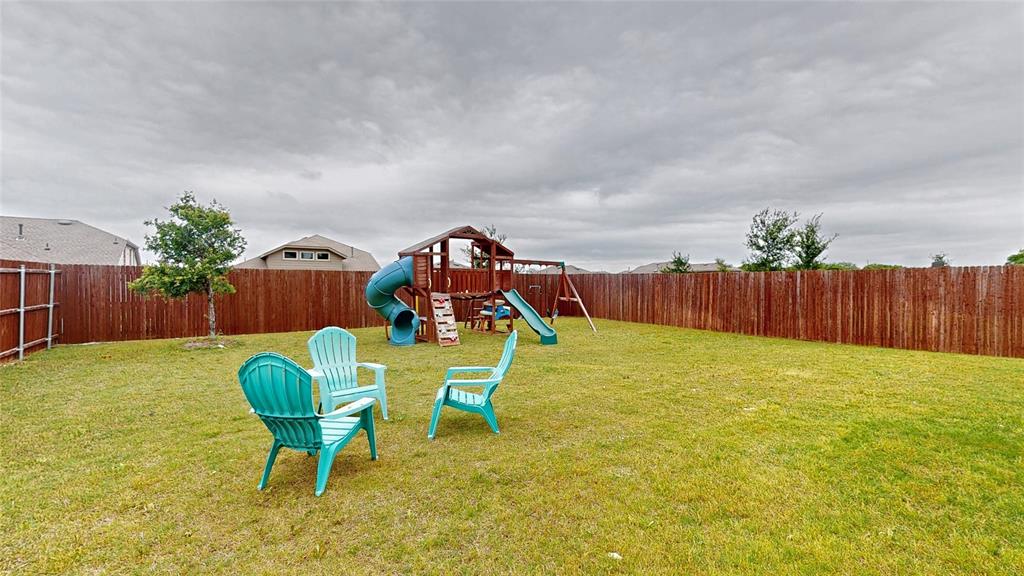 4005 Glastonbury Road McKinney, TX 75071 - Photo 38 of 39 a swimming pool with wooden fence