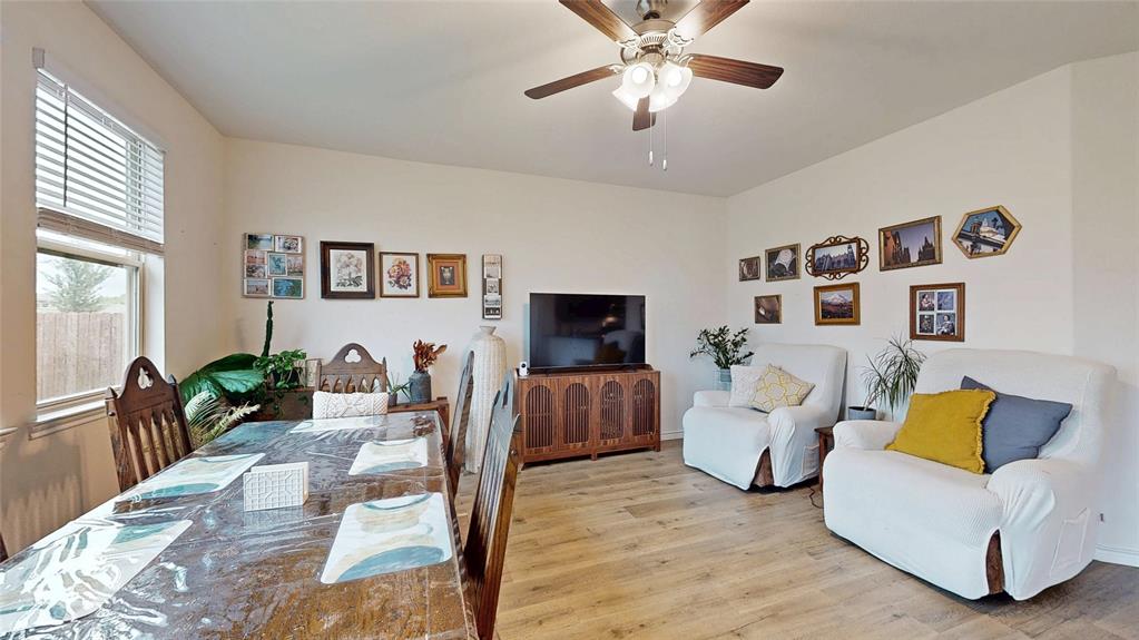 4005 Glastonbury Road McKinney, TX 75071 - Photo 4 of 39 a living room with furniture and wooden floor