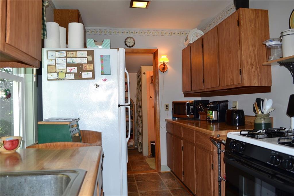 26 Samuels Landing Road Phippsburg, ME 04562 - Photo 10 of 30 Kitchen with full Bath at end of room