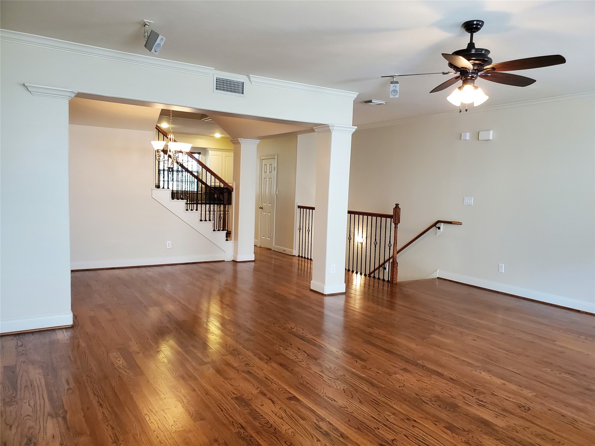 326 Malone Street Houston, TX 77007 - Photo 9 of 25 wooden floor in an empty room with a window