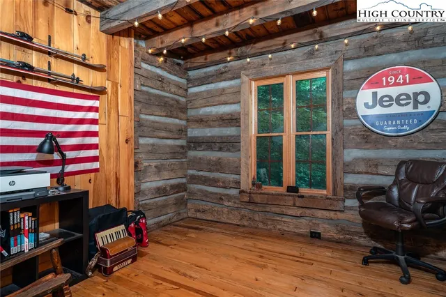 a bathroom with a sink a toilet and shower curtain