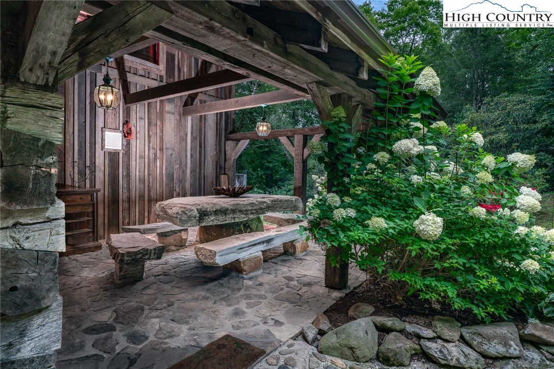 164 Avery Co High School Road Newland, NC 28657 - Photo 7 of 50 a backyard of a house with outdoor seating