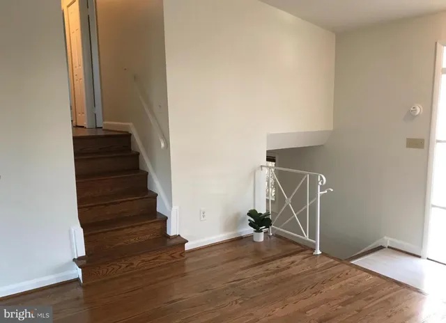 a view of entryway with wooden floor