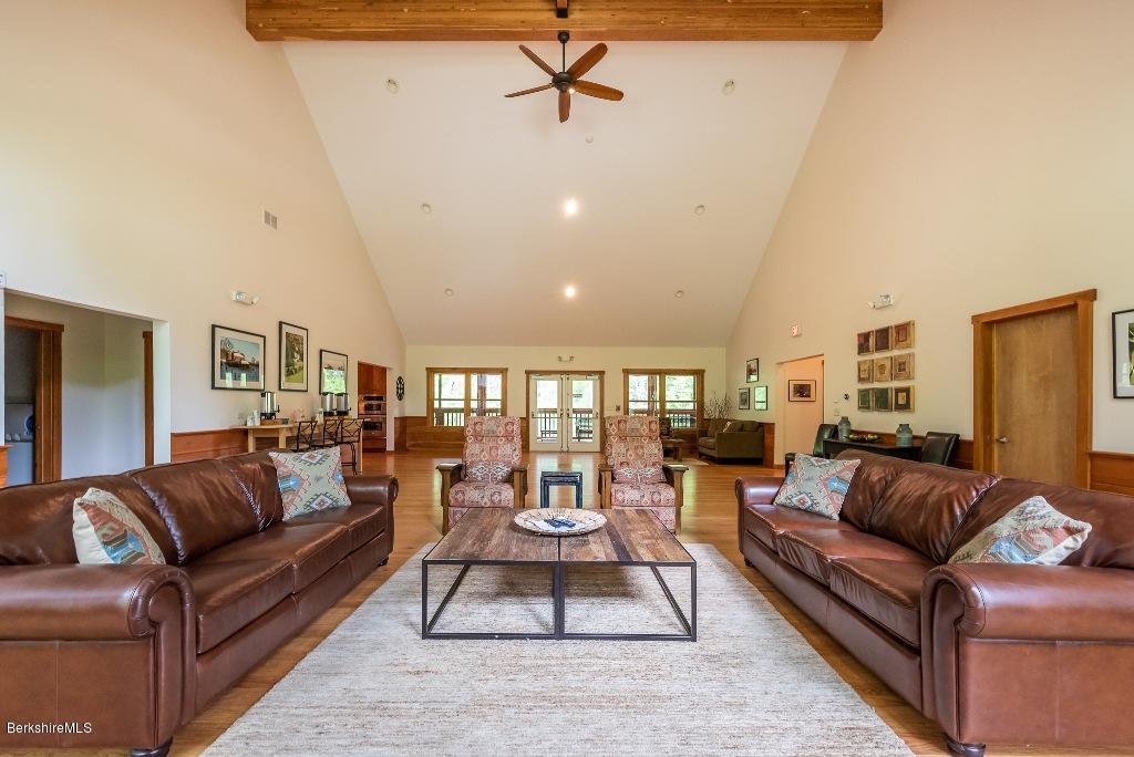 7 Sunset Court Otis, MA 01253 - Photo 13 of 21 a living room with furniture and a wooden floor