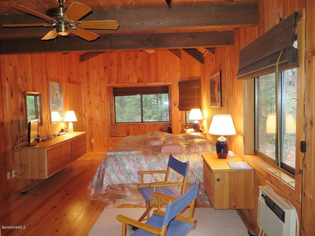 7 Sunset Court Otis, MA 01253 - Photo 6 of 21 a view of a dining room with furniture a chandelier and wooden floor