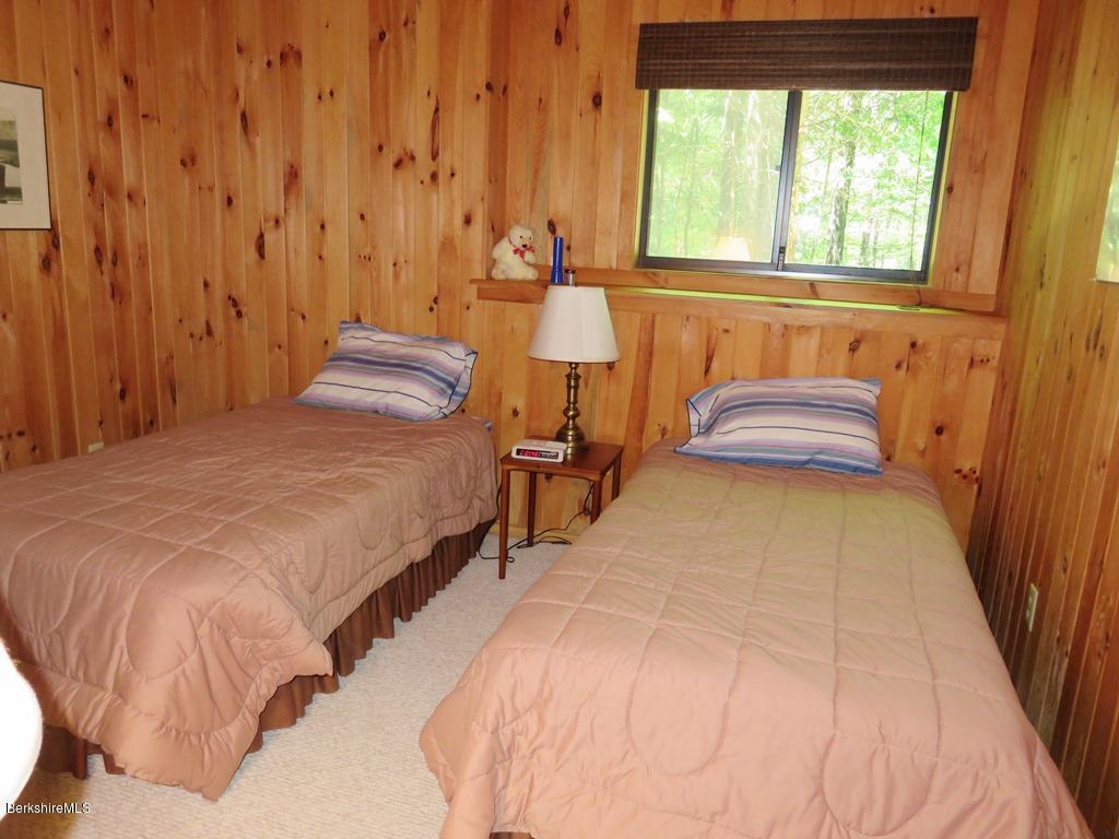 7 Sunset Court Otis, MA 01253 - Photo 9 of 21 a spacious bedroom with a bed and a window