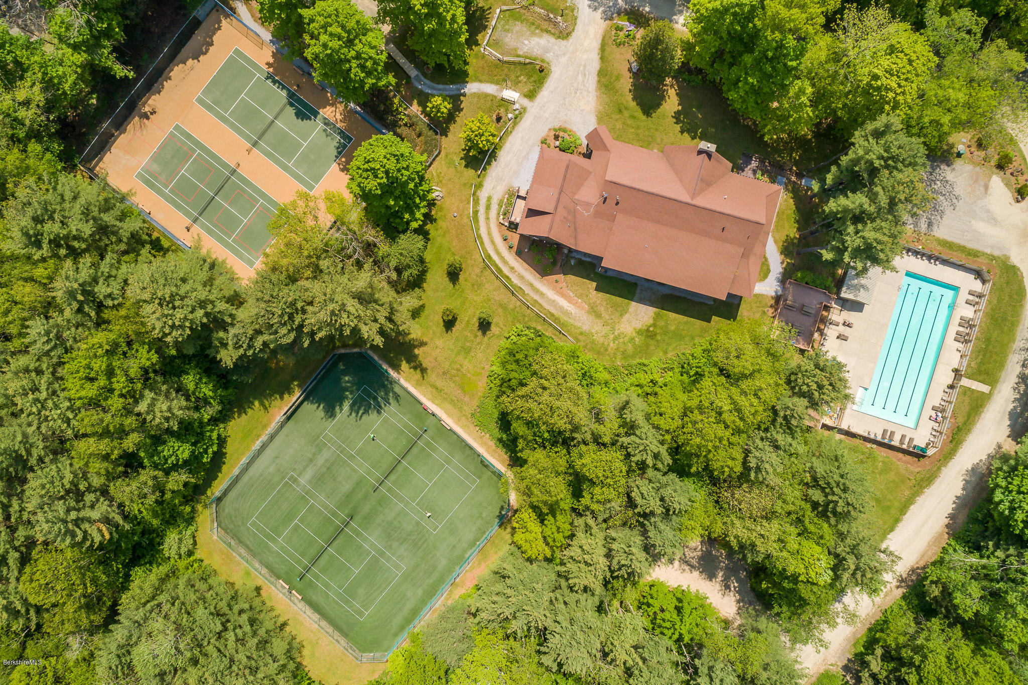 7 Sunset Court Otis, MA 01253 - Photo 10 of 21 an aerial view of a house with a garden and swimming pool
