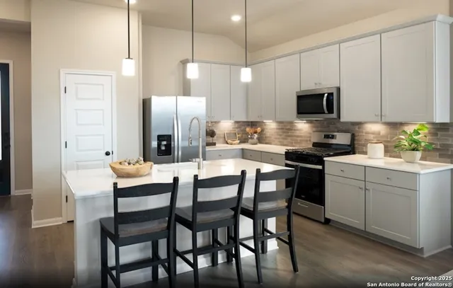 a view of a dining room with furniture