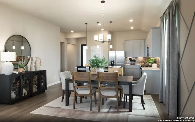 a living room with furniture a flat screen tv and large window