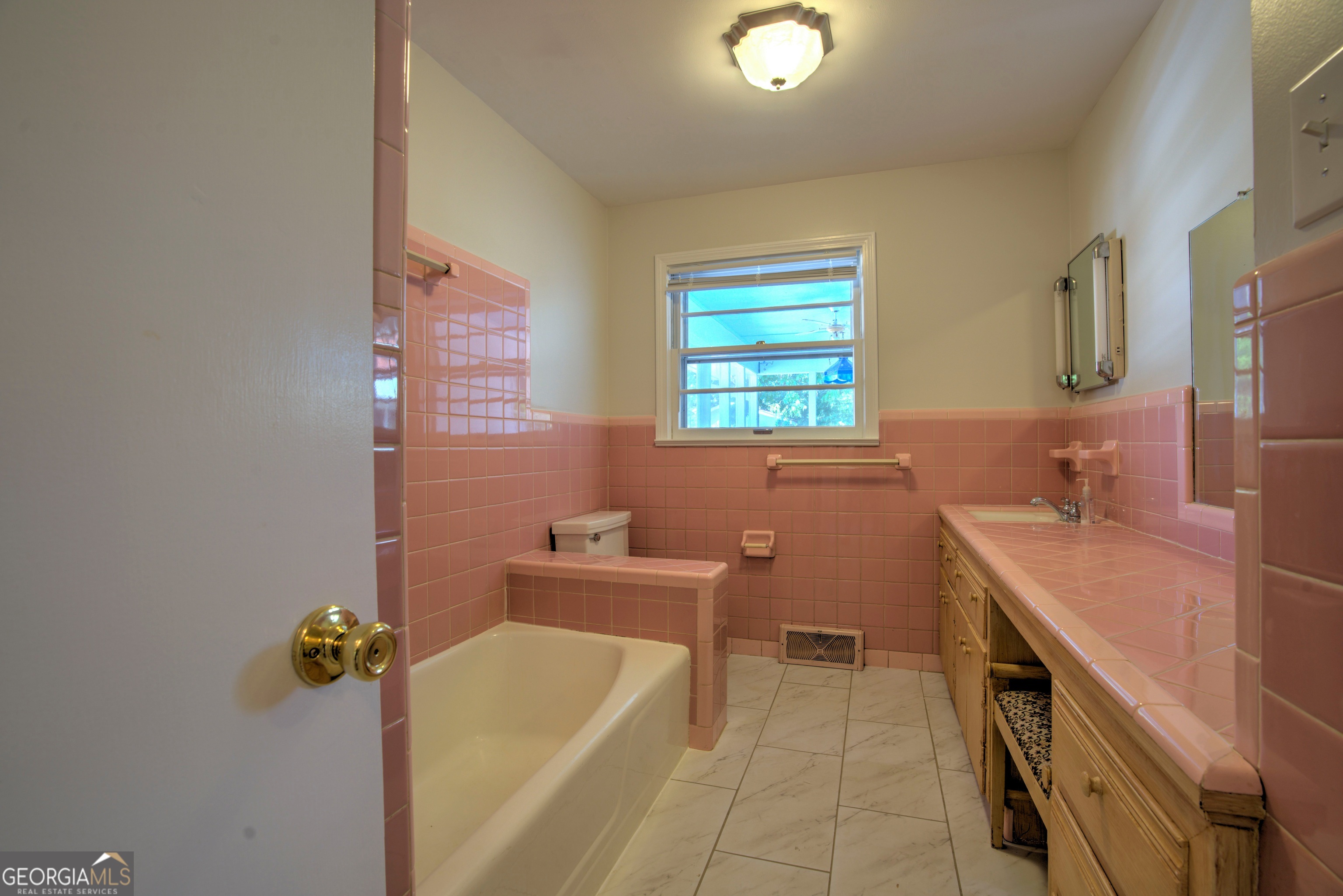 25 Ridge Drive Southwest Rome, GA 30165 - Photo 13 of 37 a bathroom with a tub sink and mirror
