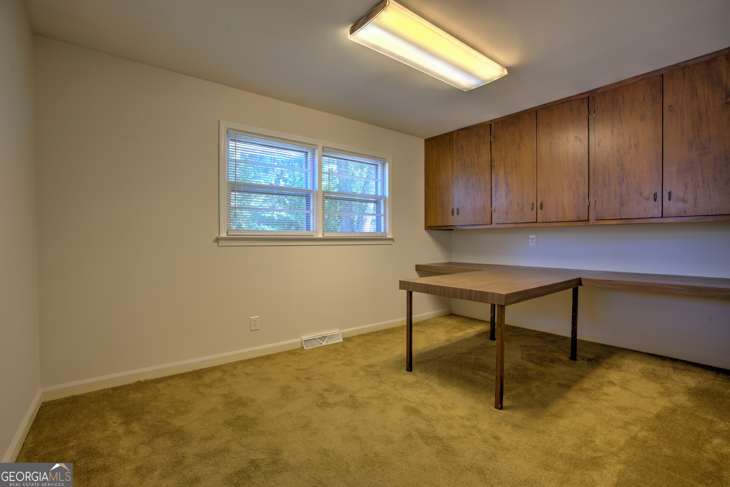 25 Ridge Drive Southwest Rome, GA 30165 - Photo 18 of 37 a view of an empty room with a window