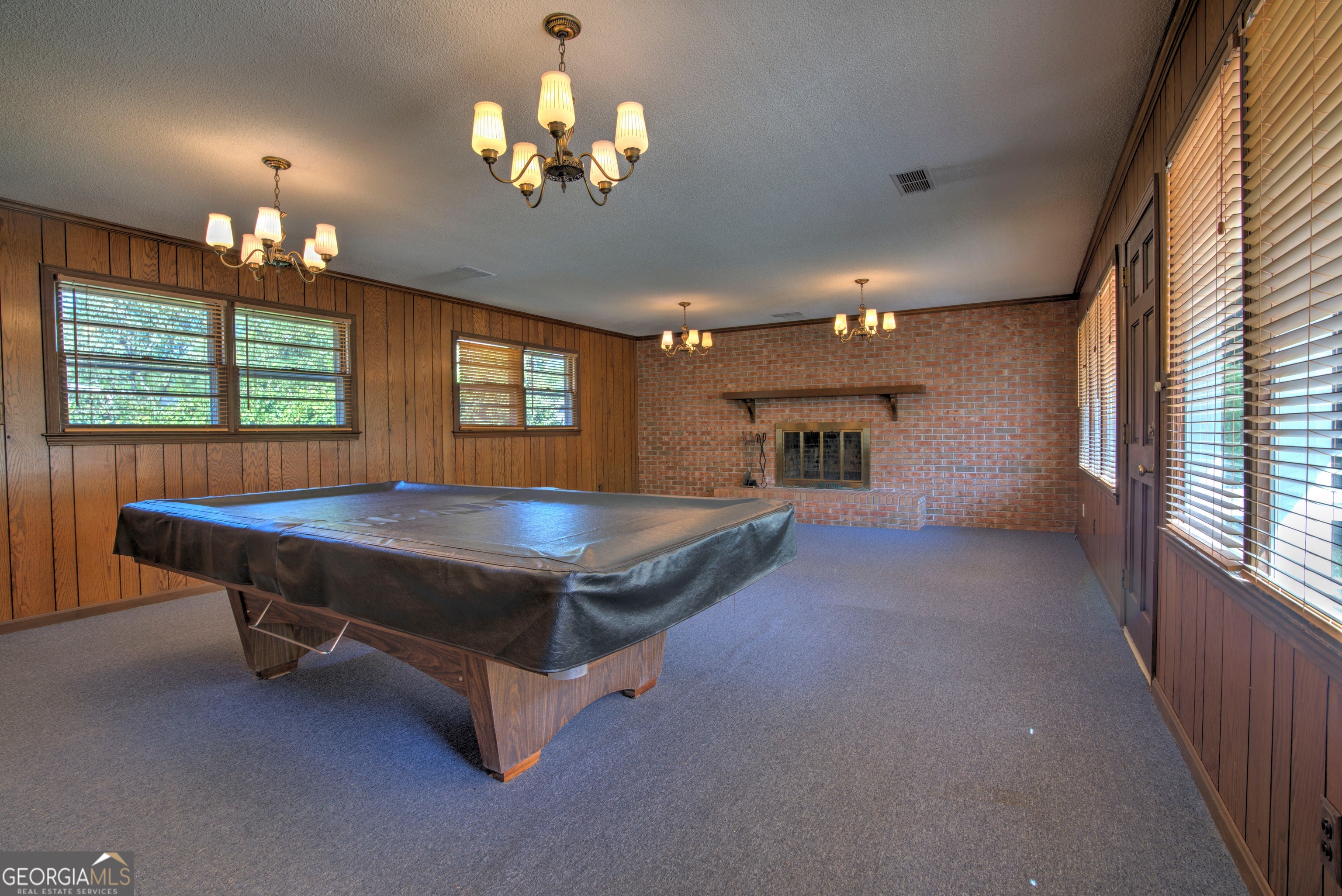 25 Ridge Drive Southwest Rome, GA 30165 - Photo 19 of 37 a room with pool table windows and a chandelier