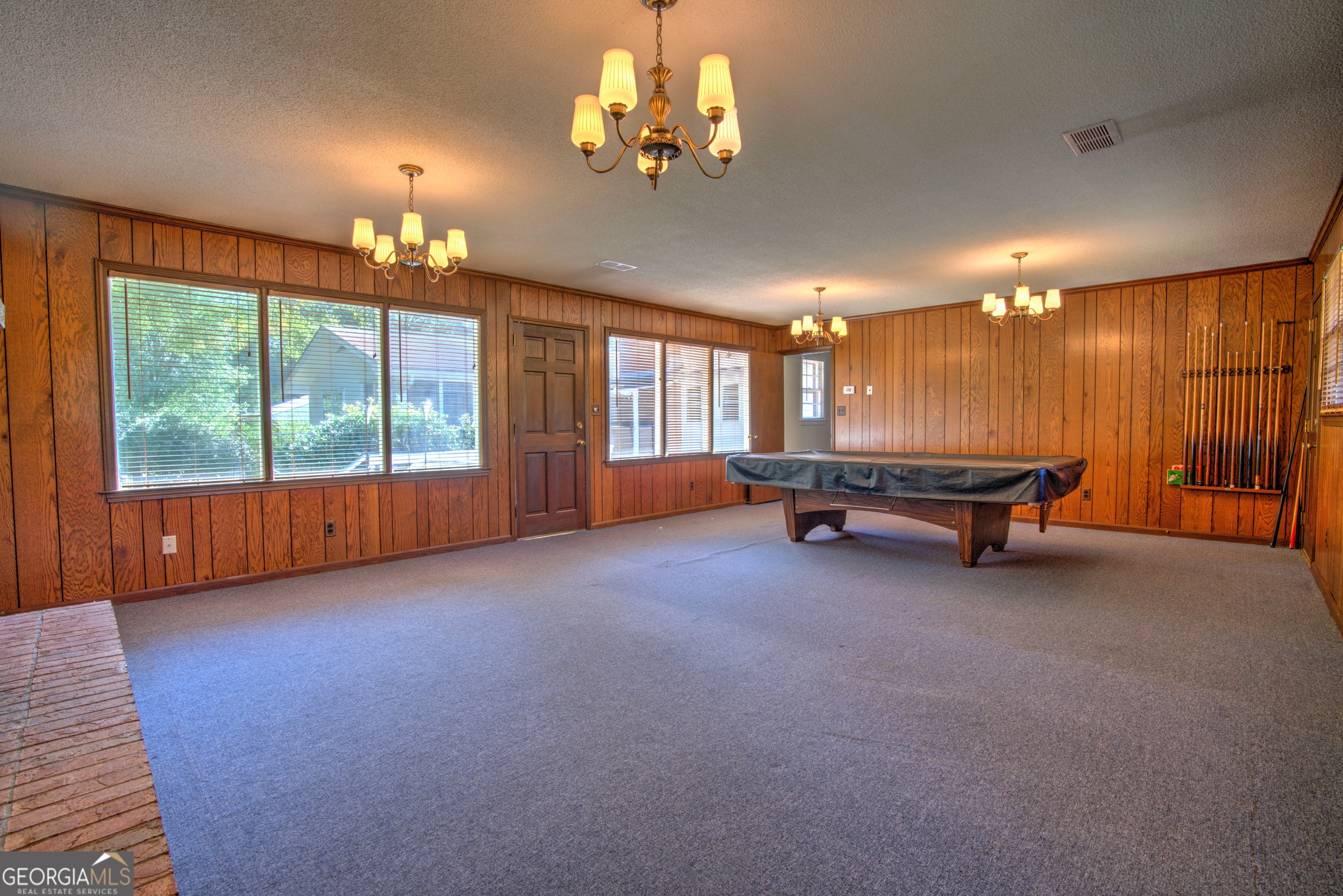 25 Ridge Drive Southwest Rome, GA 30165 - Photo 20 of 37 a room with gym equipment and large windows
