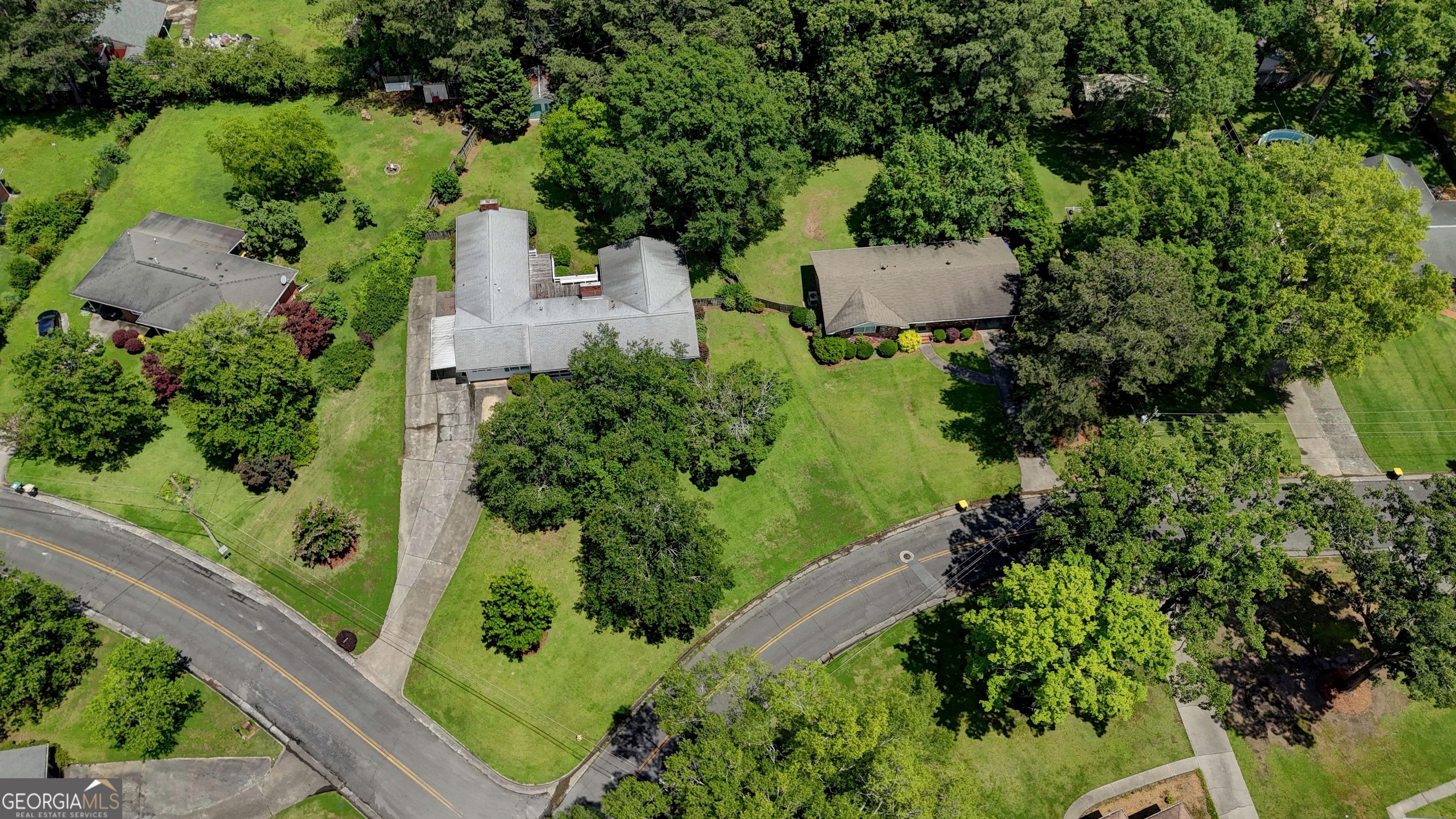25 Ridge Drive Southwest Rome, GA 30165 - Photo 33 of 37 an aerial view of a house with a yard and outdoor seating