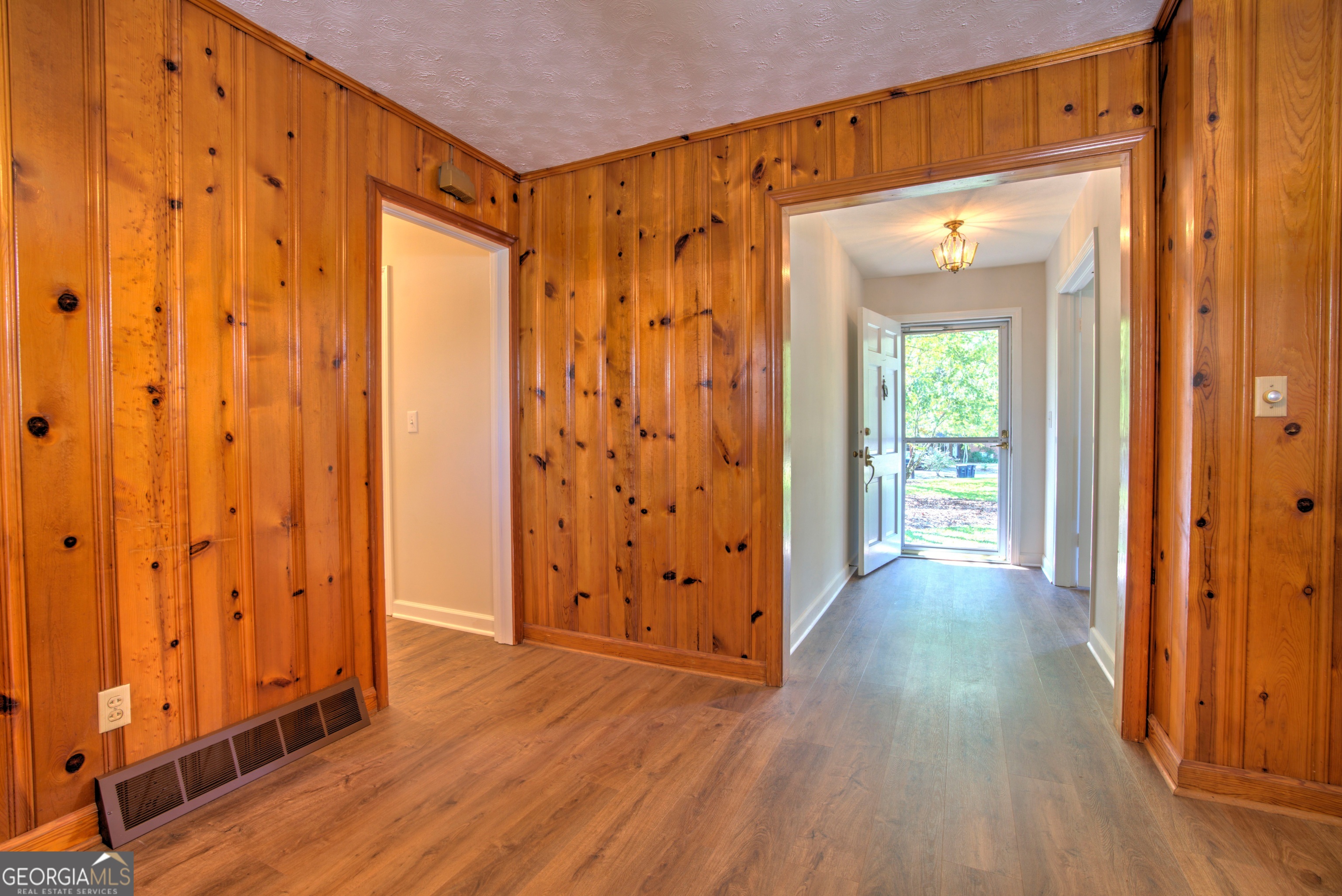 25 Ridge Drive Southwest Rome, GA 30165 - Photo 6 of 37 a view of a hallway with wooden floor and closet area