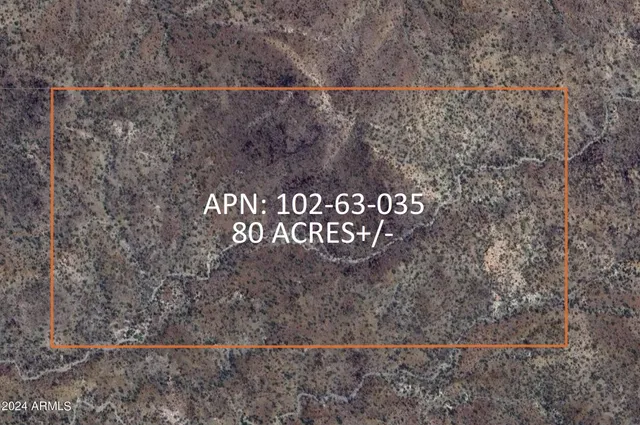 a view of a lake with mountains in the background