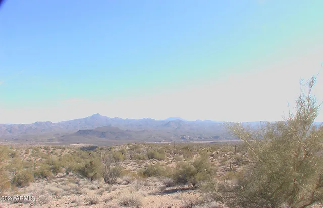 a view of mountains and valleys