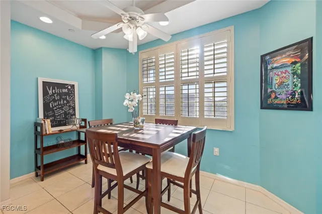 a bedroom with two beds and a window