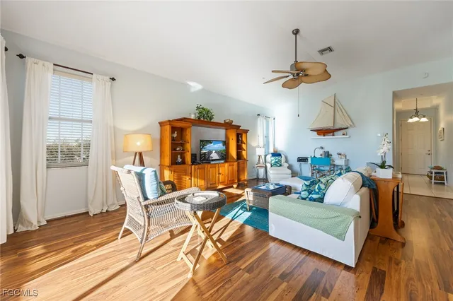 a bathroom with a toilet a sink and a mirror