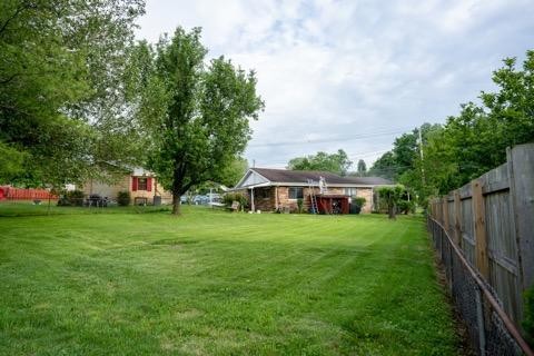 123 Manchester Road Oak Ridge, TN 37830 - Photo 26 of 26 a front view of house with yard and trees
