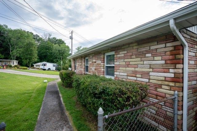 123 Manchester Road Oak Ridge, TN 37830 - Photo 6 of 26 a front view of a house with garden
