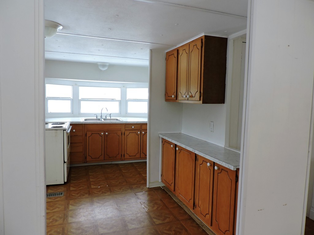 46 Madden Road, Unit 11 West Brookfield, MA 01585 - Photo 5 of 10 a view of a kitchen and a window